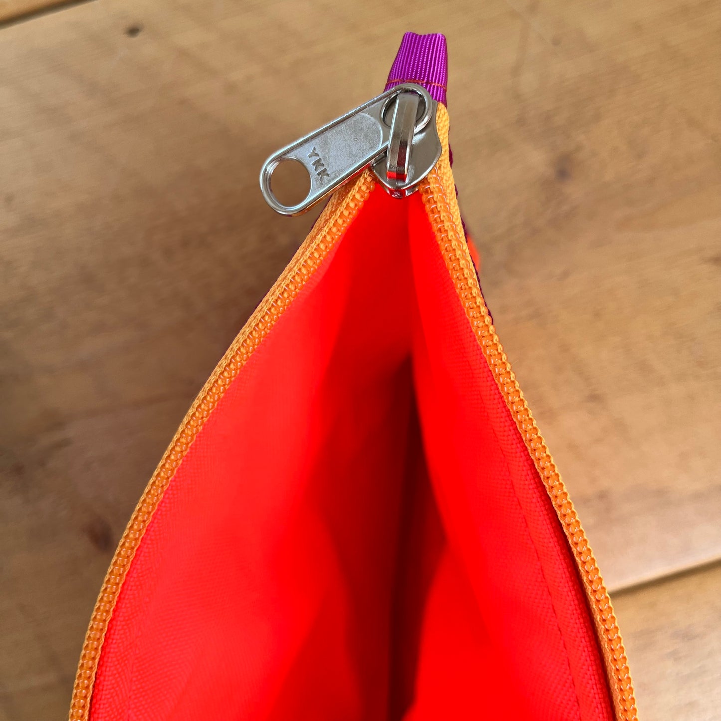 the Clutch | laser orange