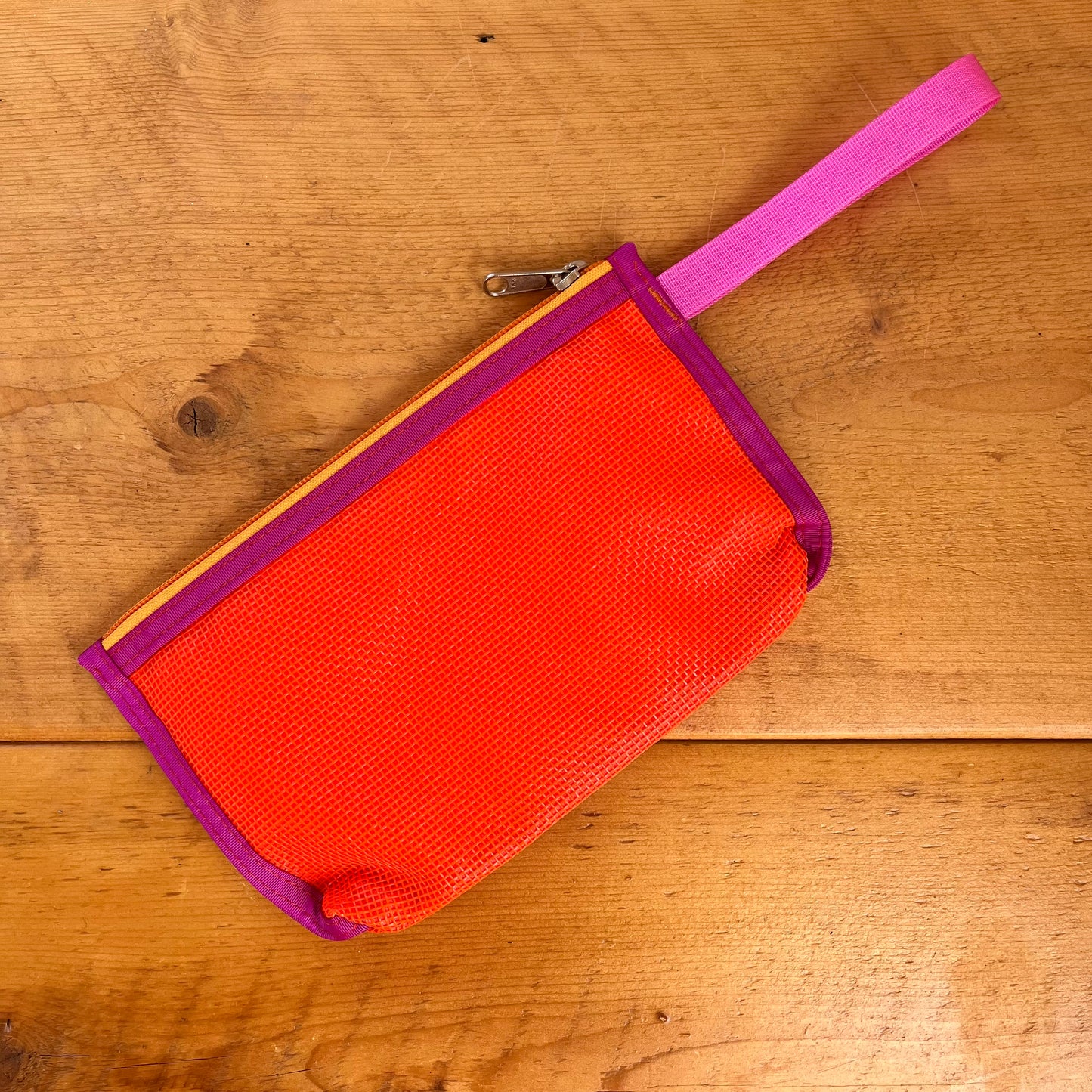 the Clutch | laser orange